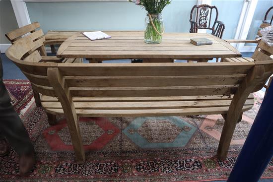 Gaze Burvill. An oak garden table, bench, low bench and pair of chairs Table L.170cm, Bench L.210cm, Low bench L.195cm